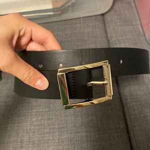 Black belt gold buckle